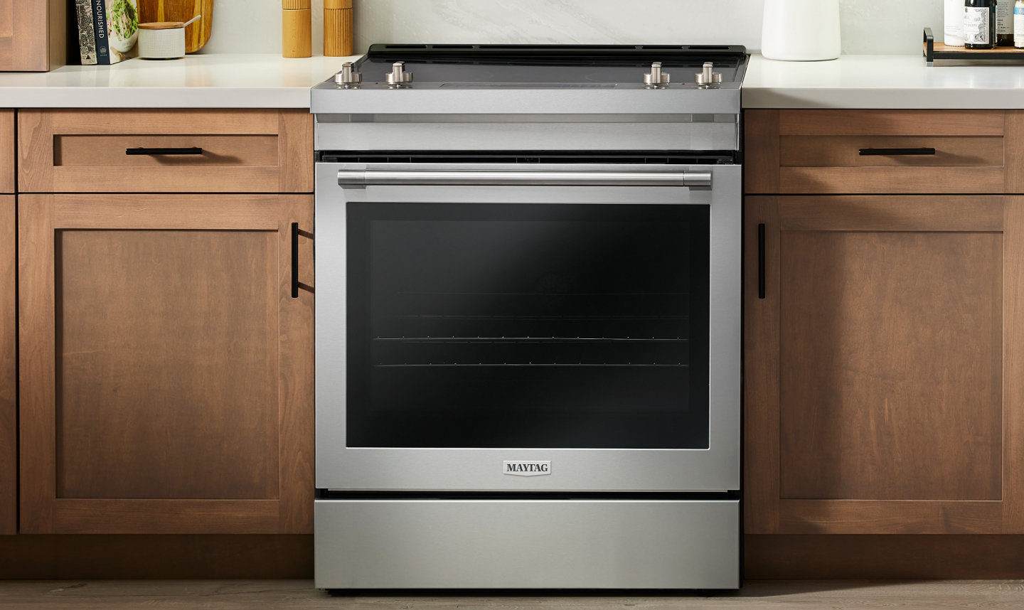A Maytag® electric oven in a modern kitchen