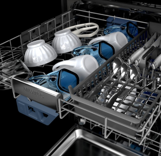 Cups and mugs inside a dishwasher