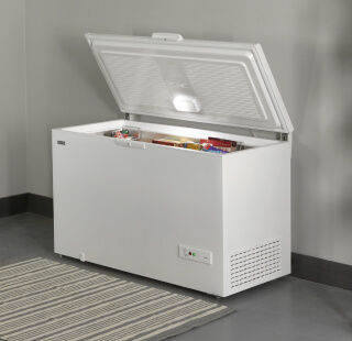 An open Maytag® chest freezer
