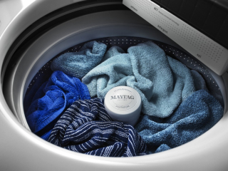 Laundry inside a top load washing machine