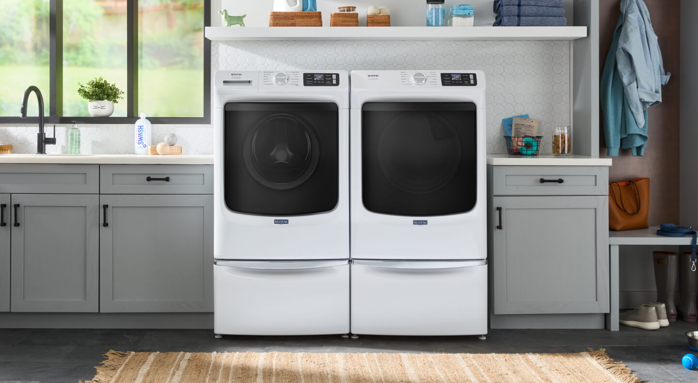 Maytag® washer and dryer in a laundry room