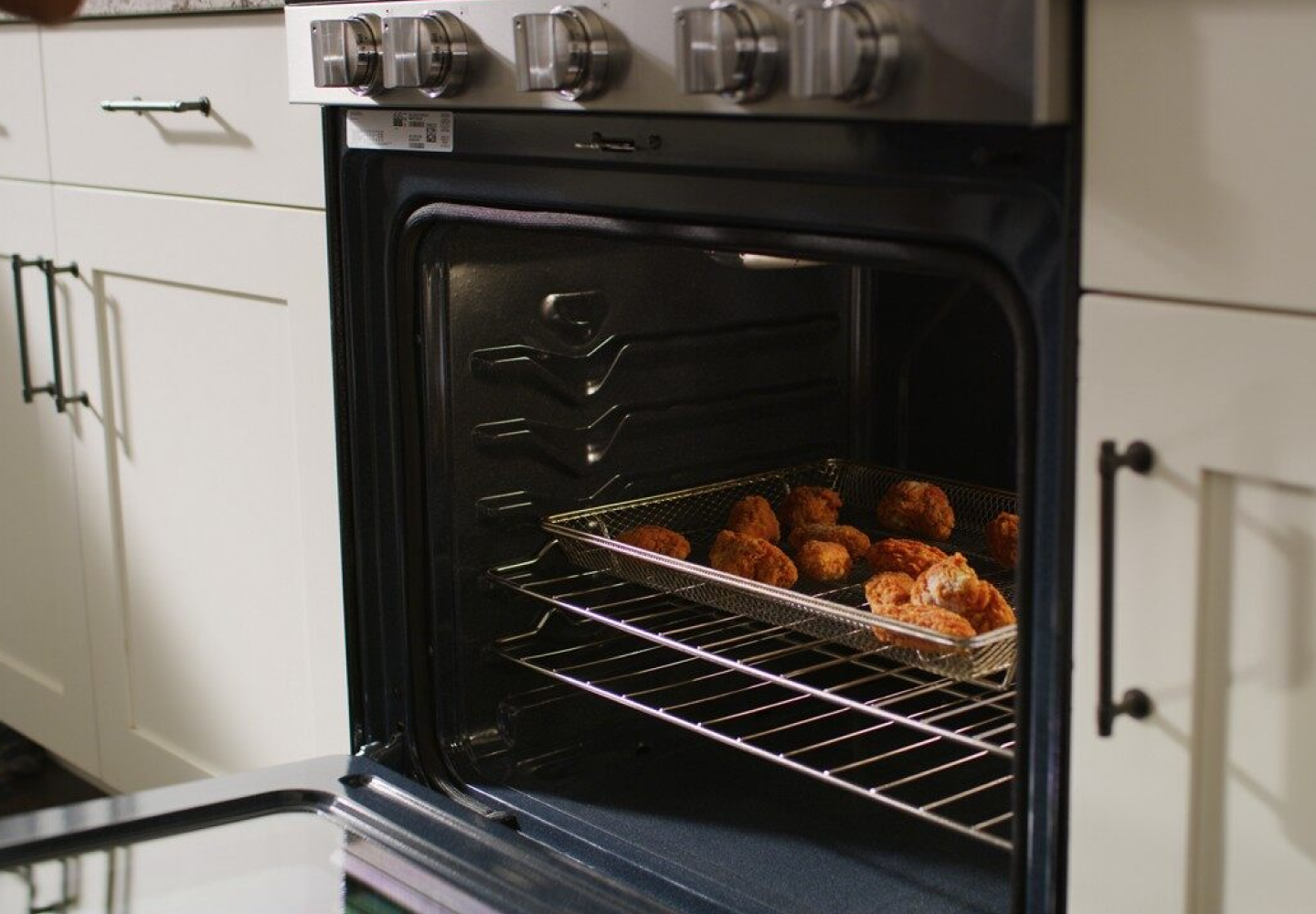Maytag® range with the door open