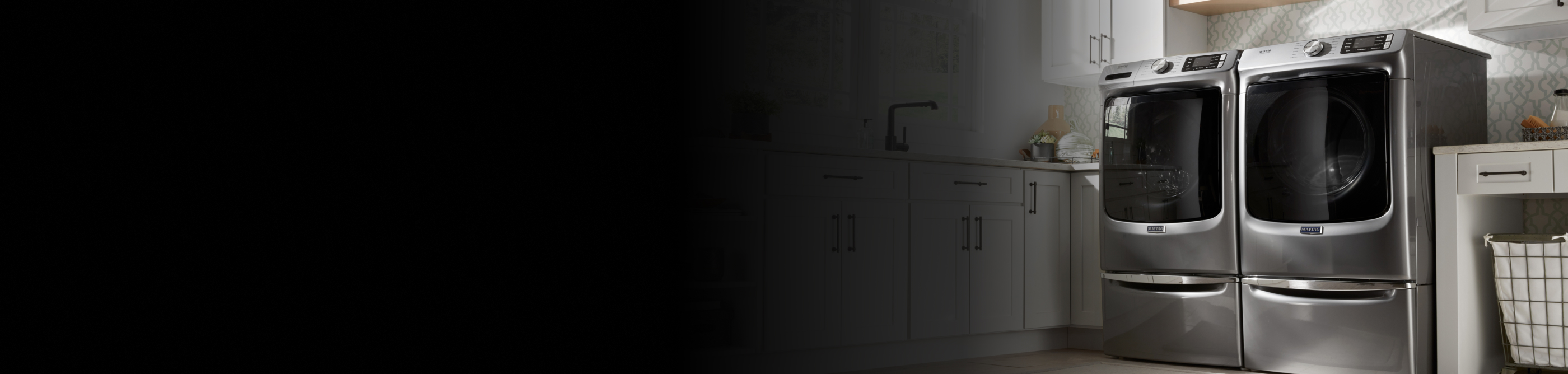 Maytag® dryer in a white laundry room