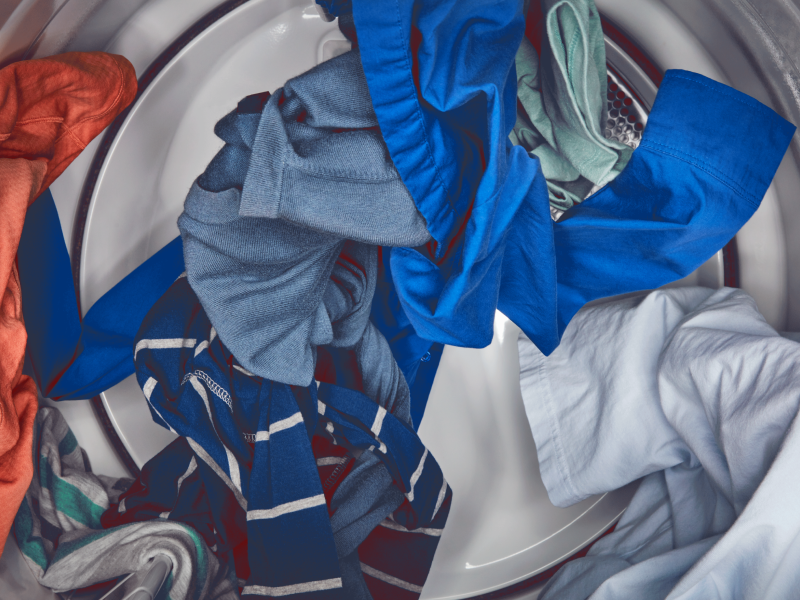 A load of laundry tumbling in the dryer