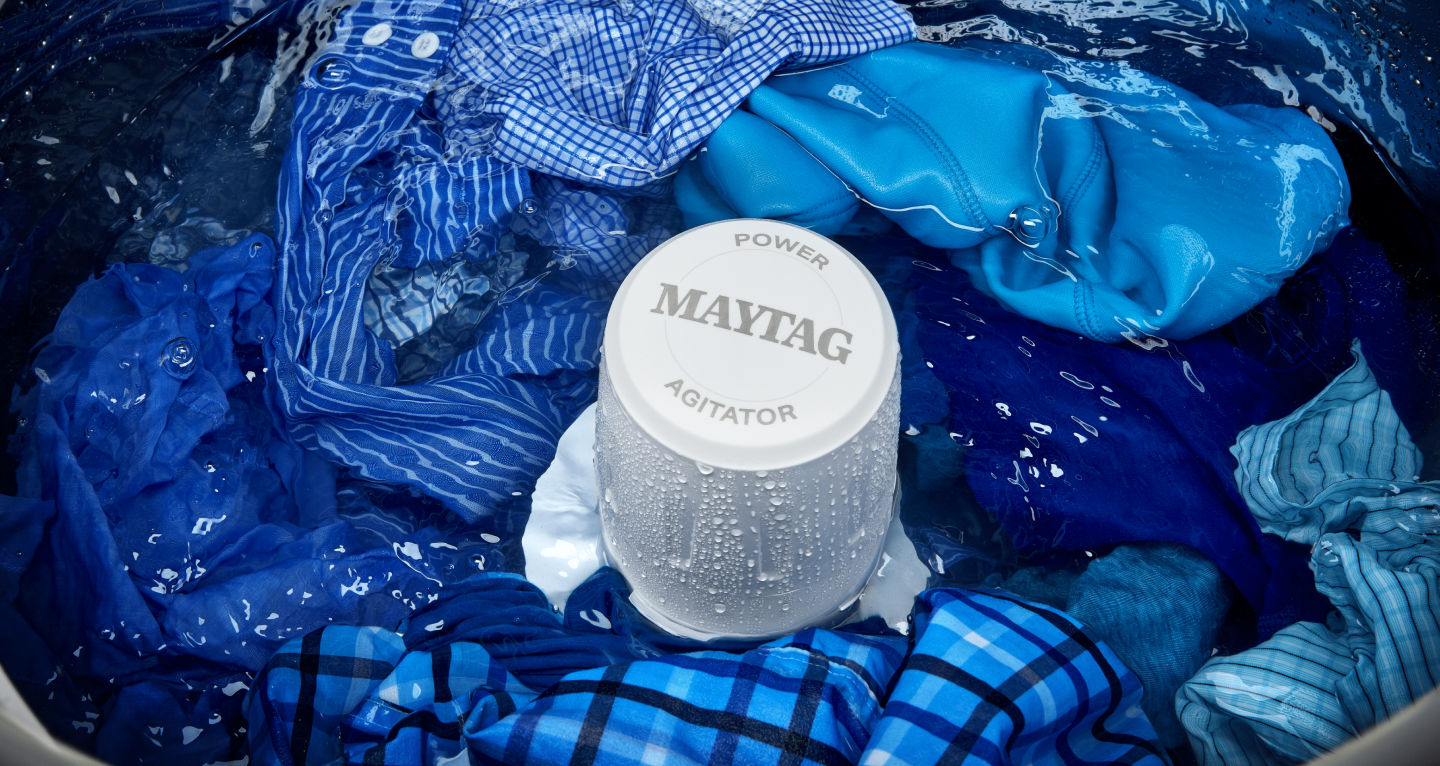Garments in water around Maytag® agitator