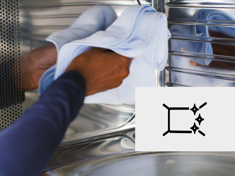 Cleaning the interior of a microwave.