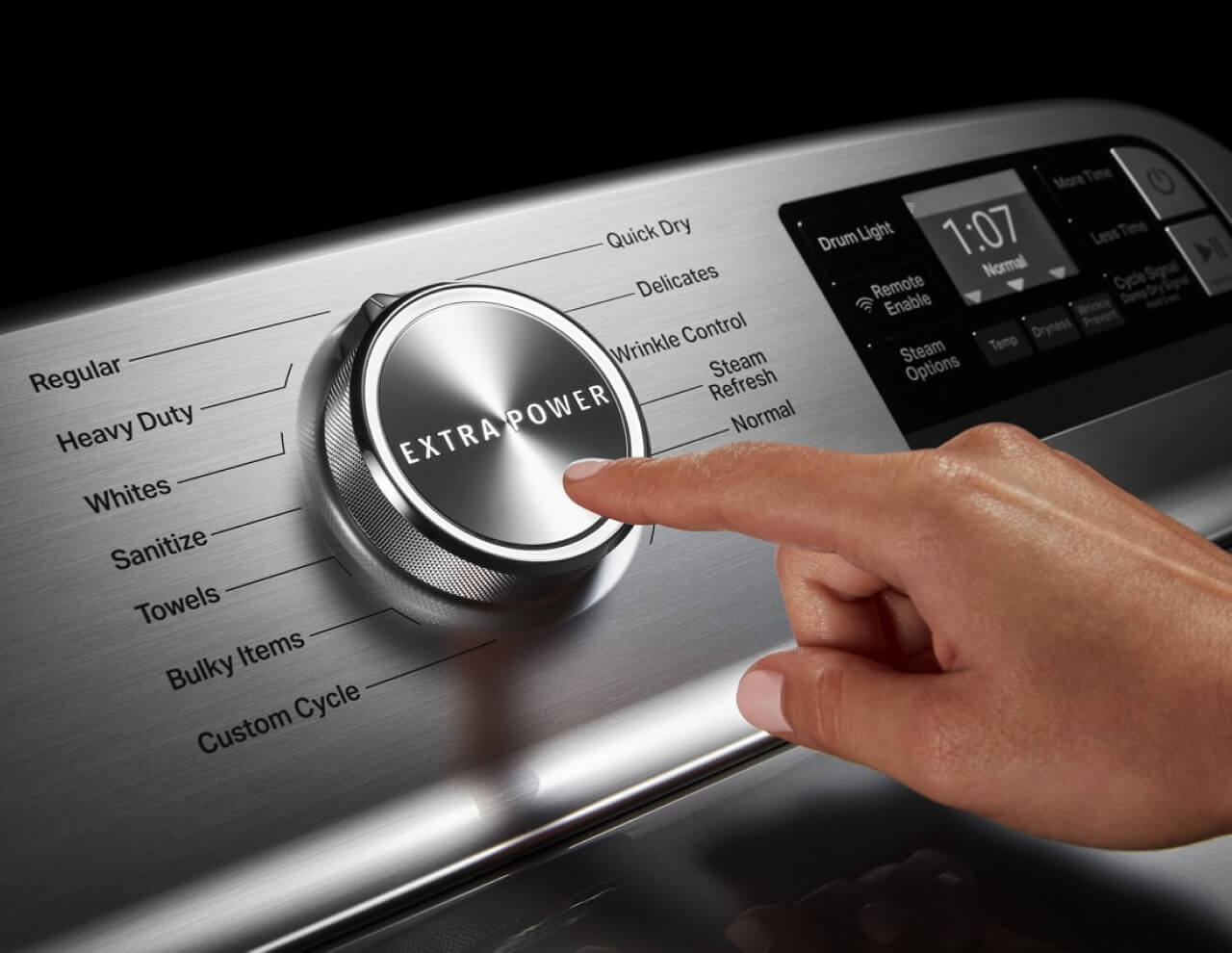 A person using the Maytag® Dryer with the Extra Power Button
