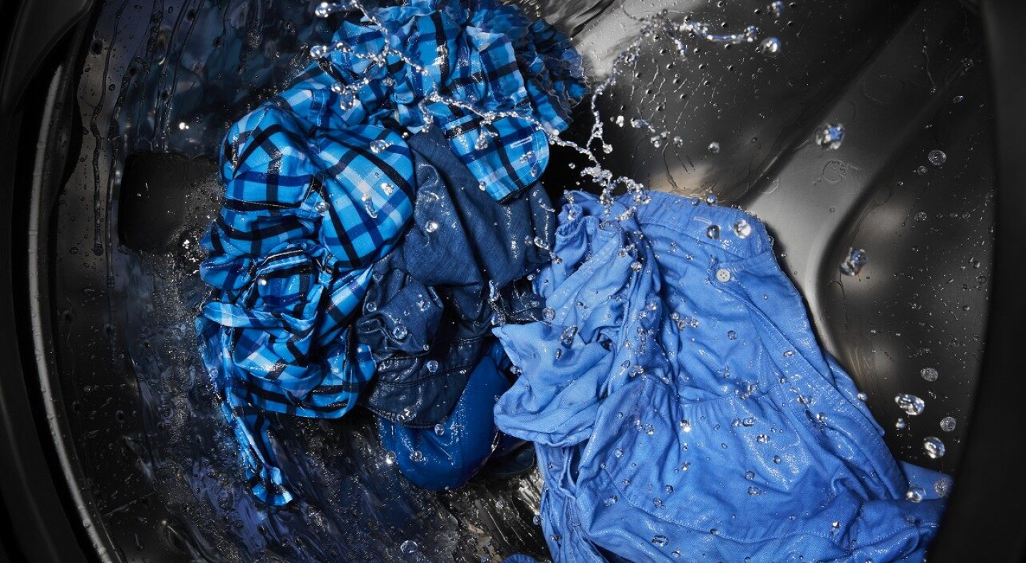 Action shot of a load of laundry in the washing machine