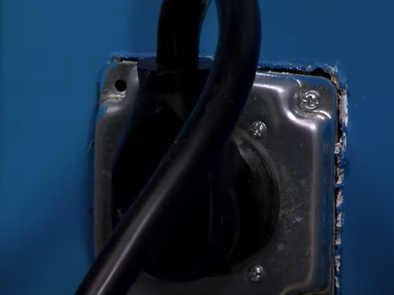 A closeup of an electrical outlet