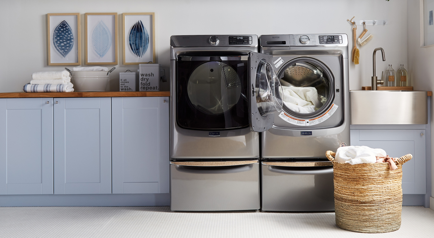 Metallic gray Maytag® front load washer and dryer