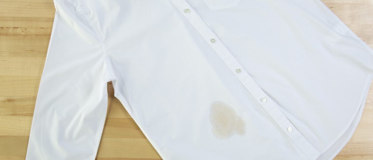 A white shirt with a coffee stain