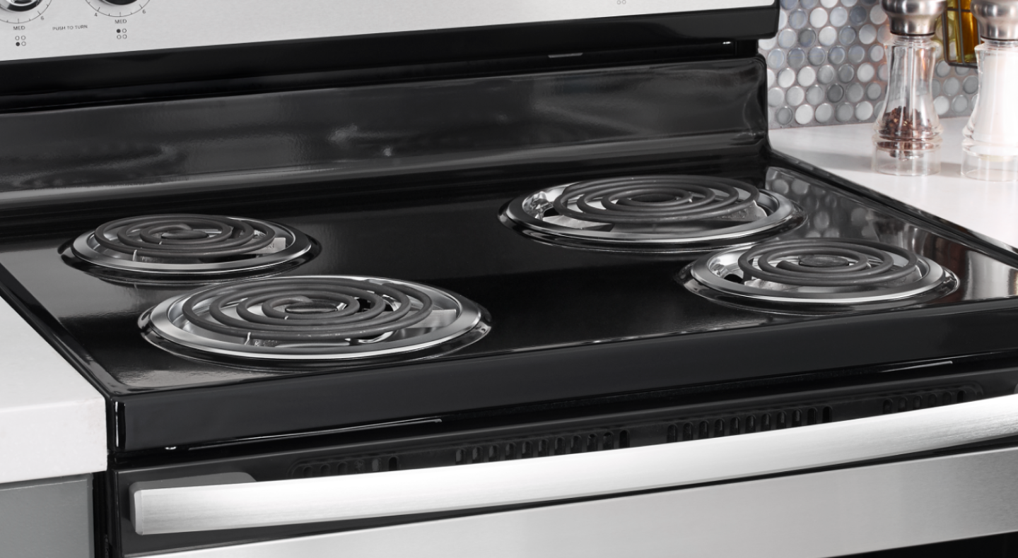 The top of an electric stove with coil burners.