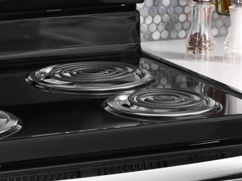 The top of an electric stove with coil burners.