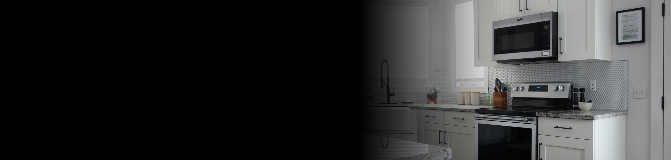 Maytag® electric range and over-the-range microwave in modern kitchen