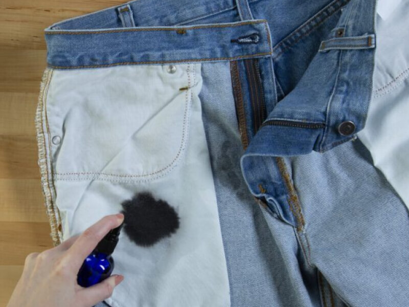 Treating an ink stain on the inside pocket of a pair of jeans