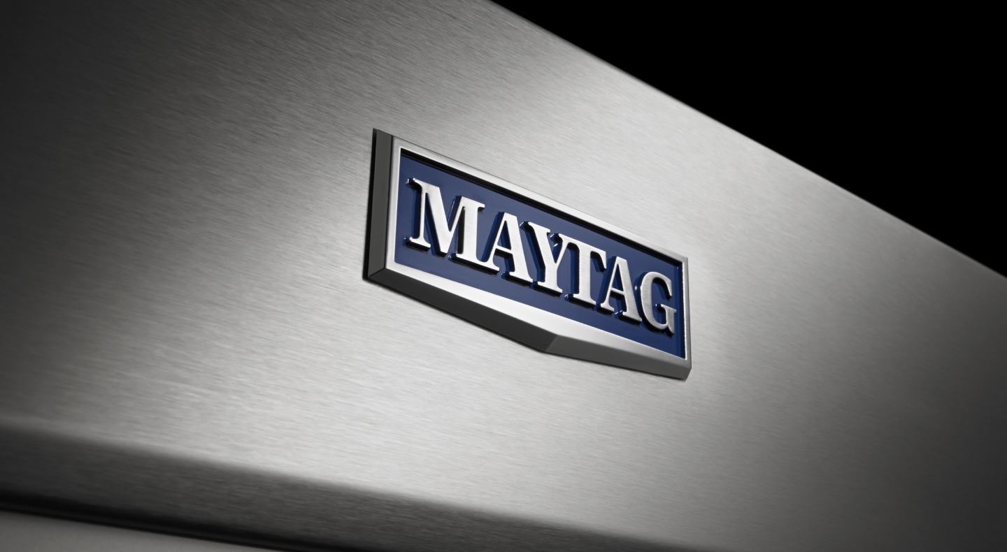 Maytag® logo on stainless steel appliance