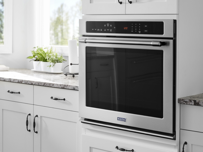 A stainless steel single wall oven