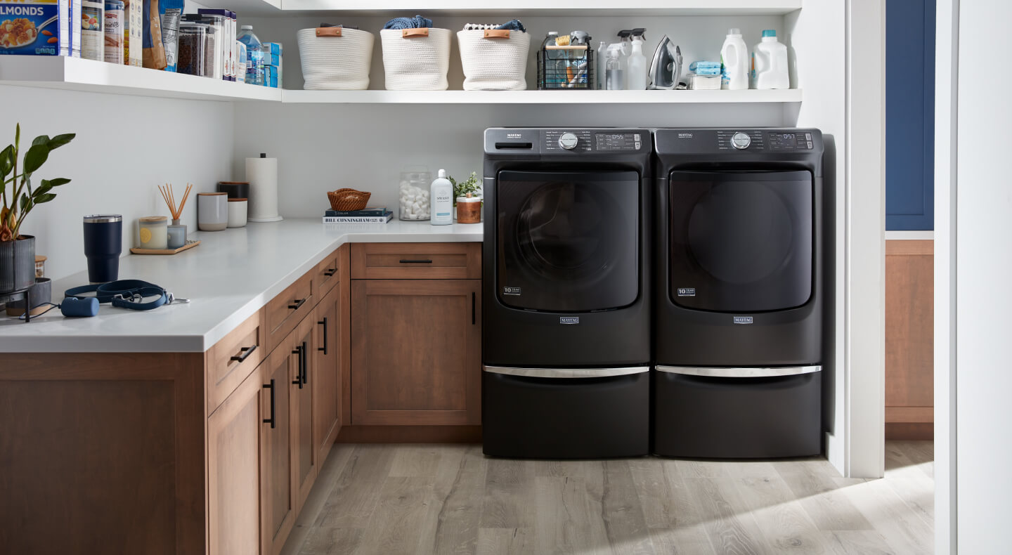 Washer and dryer set in a laundry room
