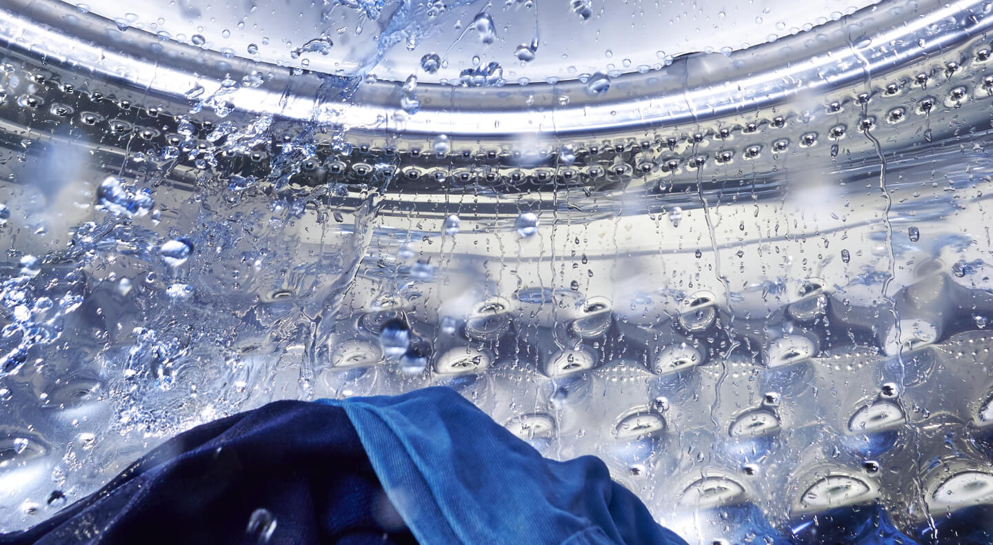 Water splashing in a Maytag® washing machine drum