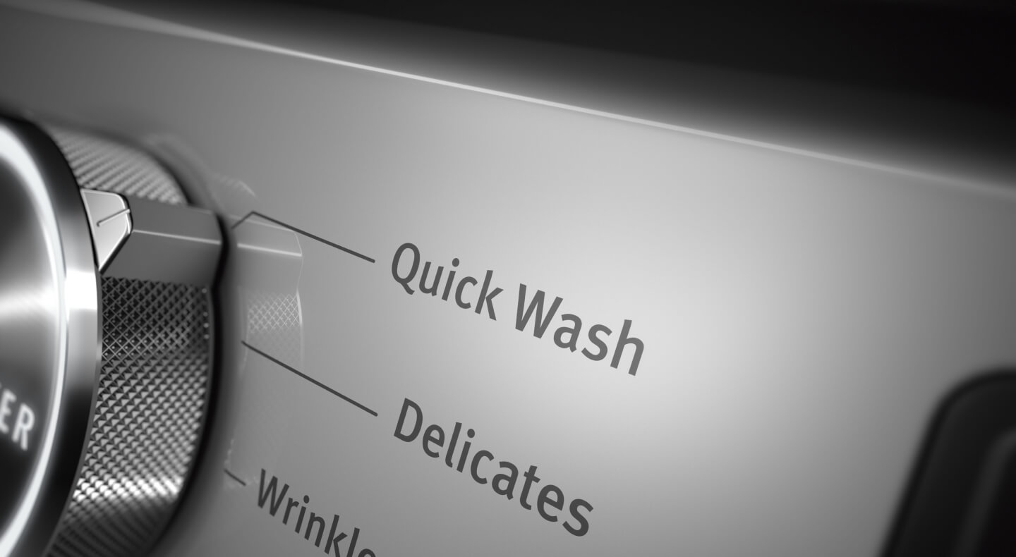 A closeup of the Quick Wash setting on a Maytag® washer