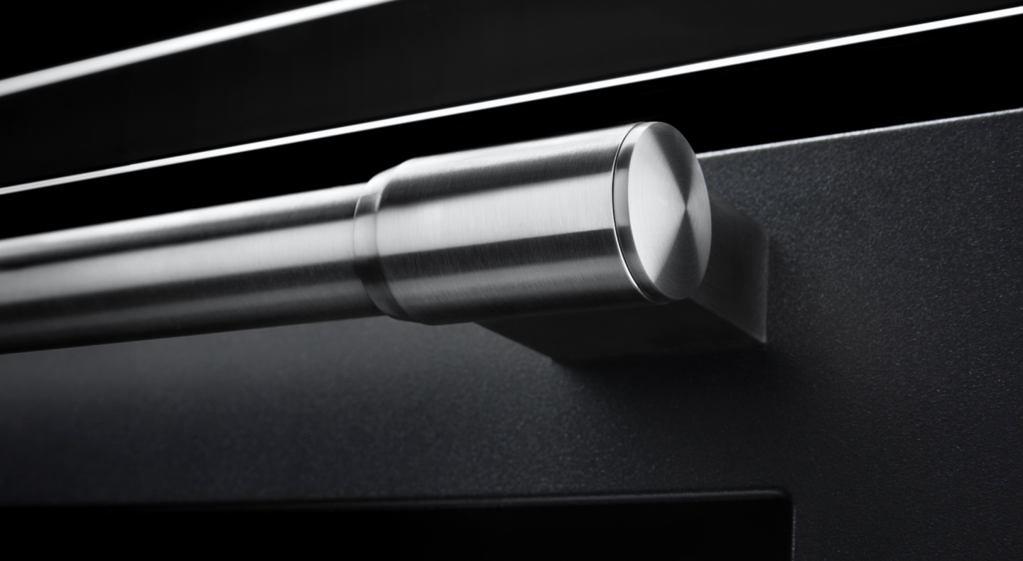 A closeup of a Maytag® oven handle