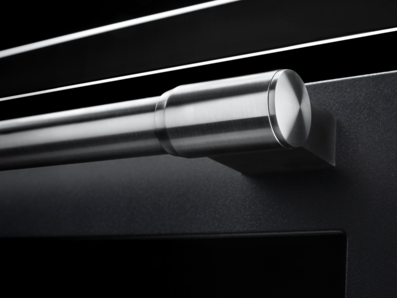 A closeup of a Maytag® oven handle