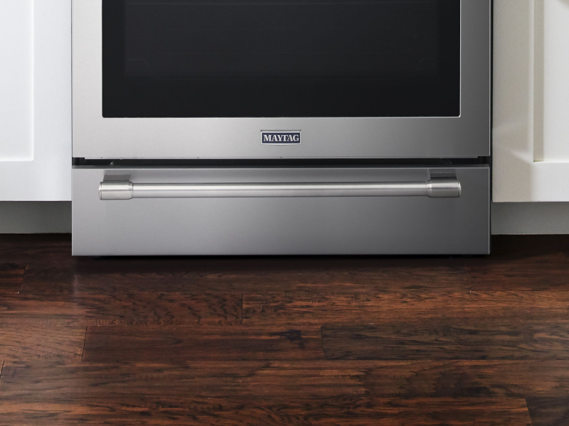A closeup of a Maytag® oven drawer