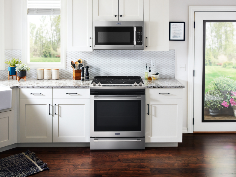 Maytag® range set in cabinetry