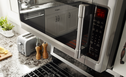 A closeup of a Maytag® over-the-range microwave