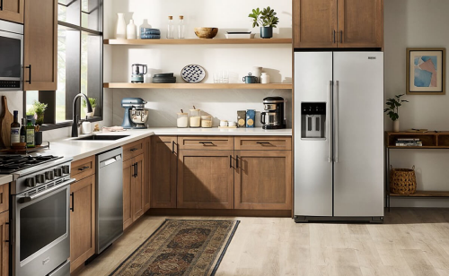 Maytag® side-by-side refrigerator with an external ice and water dispenser