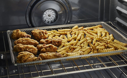 Fries in an air fryer basket