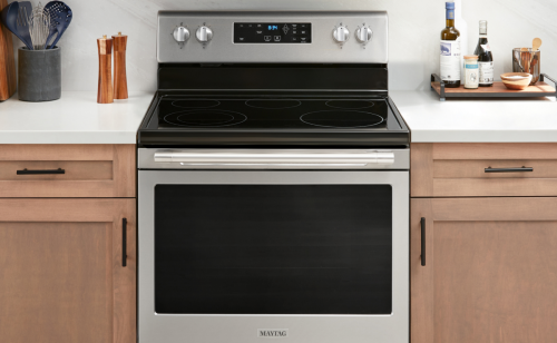 An electric range in the kitchen