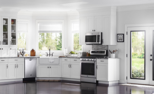 A Maytag® oven and over-the-range microwave in a modern kitchen.