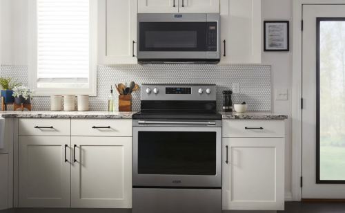Maytag® over-the-range microwave above a Maytag® electric range