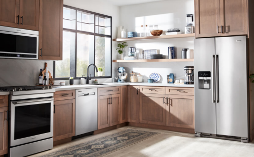 A kitchen with stainless steel Maytag® appliances