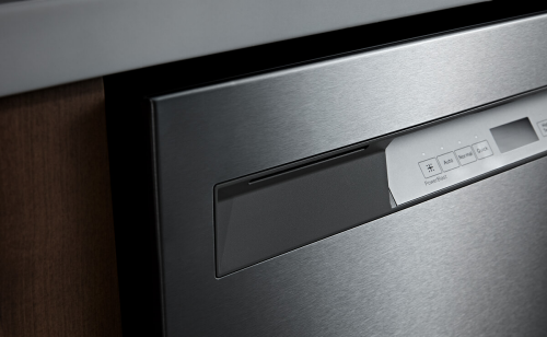 Close-up of the control panels on the front of a dishwasher