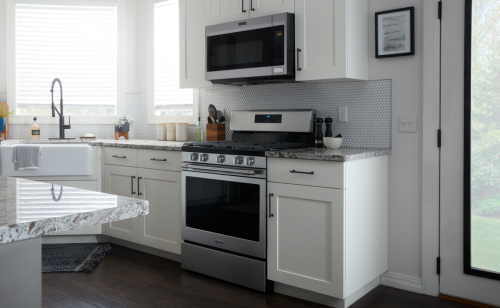 Maytag® range in white cabinetry