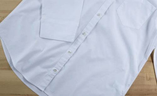 Close-up of a white button-up shirt