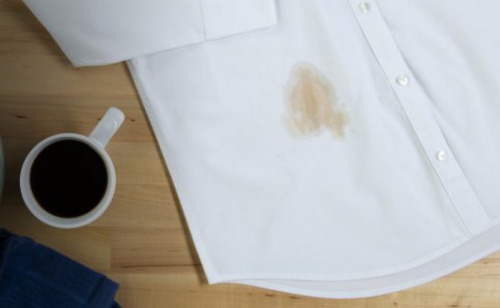 A white shirt with a coffee stain