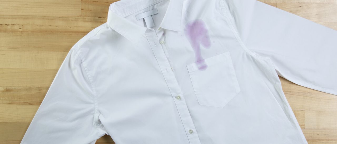 A red wine stain on a white shirt