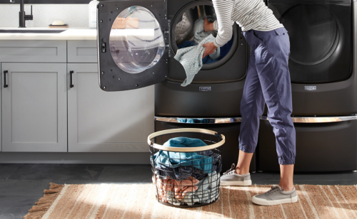 Unloading clothes from a dryer 