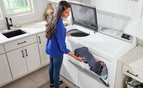 Moving clothes from washer to dryer