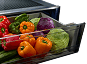 A crisper drawer filled with items
