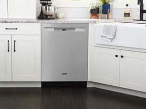 Maytag® dishwasher in white cabinetry