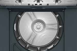 Maytag® top-load washer with open lid showing wash basket and control panel