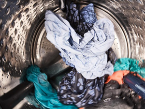 Clothes tumbling inside of a washer