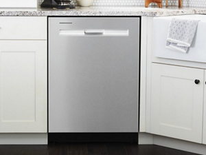 Stainless steel Maytag® dishwasher in white cabinetry