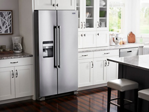 Stainless steel side-by-side refrigerator with built-in ice and water dispenser