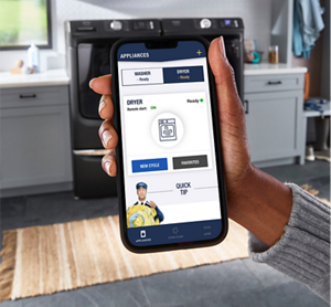 A hand holding a phone with the Maytag™ app screen