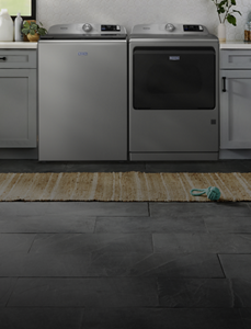A Maytag® laundry set in a laundry room